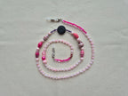 Accroche lunette - pink lady